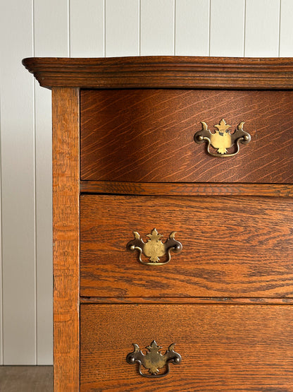 Antique Oak Serpentine Chest with Original Casters and Brass Hardware
