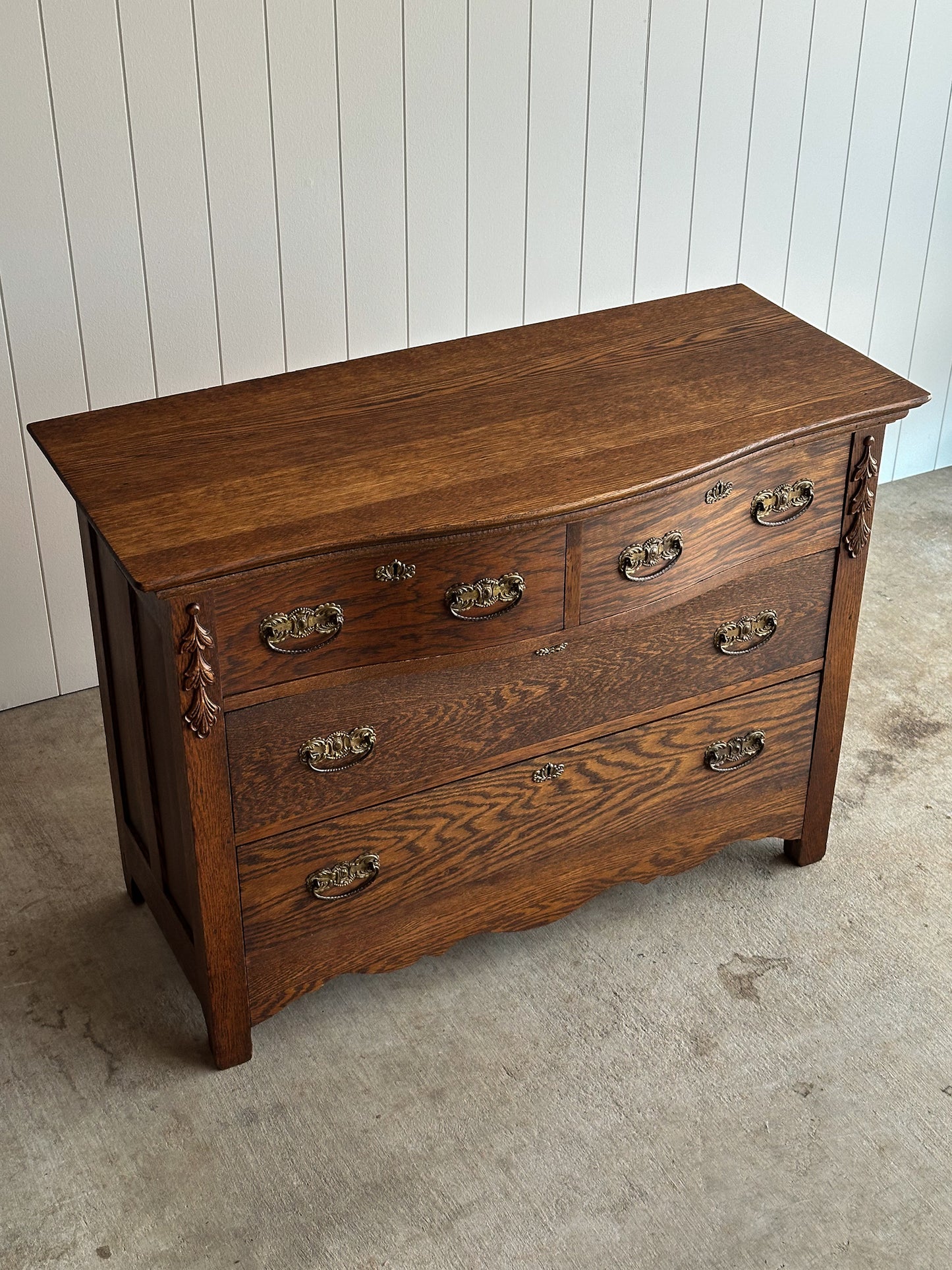 Antique Cathedral-Grain Oak Serpentine Chest of Drawers