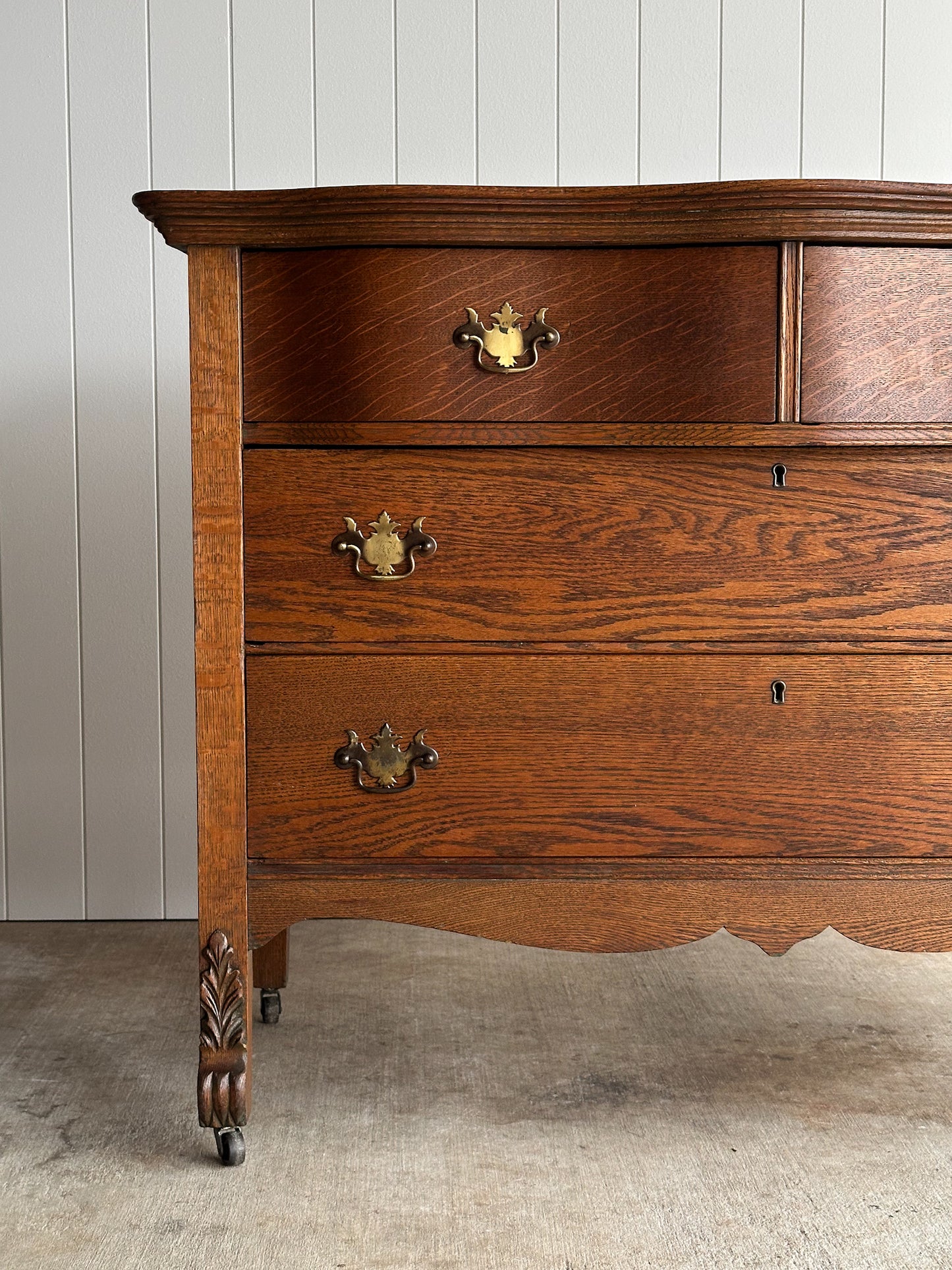 Antique Oak Serpentine Chest with Original Casters and Brass Hardware